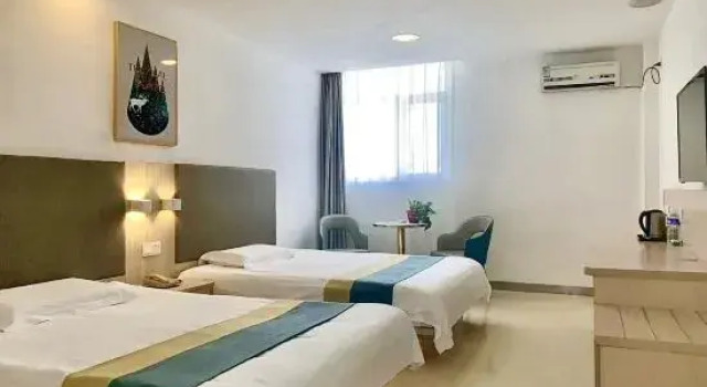 Кровать в общем номере Yijia Boutique Hotel (Shenyang Kaifa Avenue Metro Station)