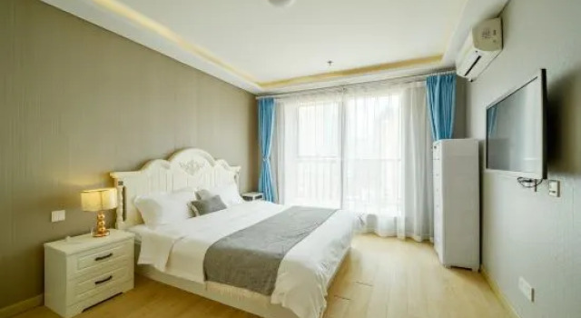Люкс с 2 комнатами с видом на гавань Yuepeng Boutique Apartment (Dalian Harbour Plaza)