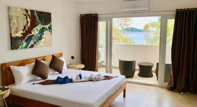 Номер Deluxe Sunset Cove Beach & Dive Resort