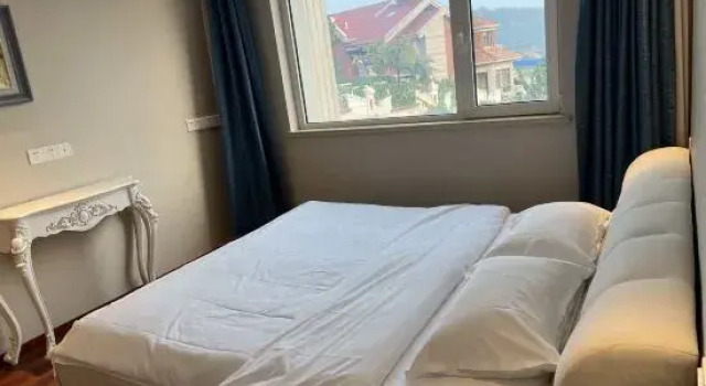 Семейный люкс с видом на море Qingdao Kaishan Yishu Homestay (Laoshan)
