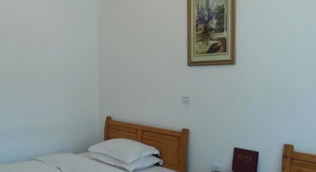Yijia Hotel Qujing, Rezerwuj Hotel Hotele w Qujing z parkingiem, Parking