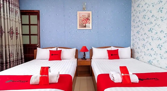 Номер Deluxe RedDoorz Nam Bac Hotel Phan Dang Luu Phu Nhuan