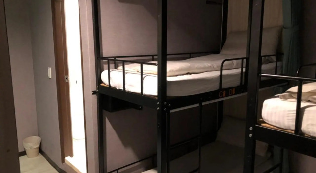 Кровать в общем номере Backpackers Hostel - Ximen