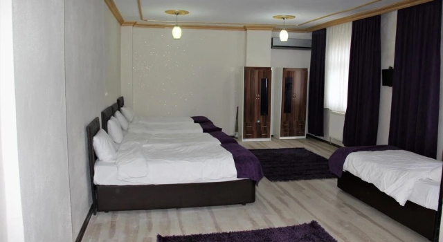 Кровать в общем номере Mitani Pension Hostel