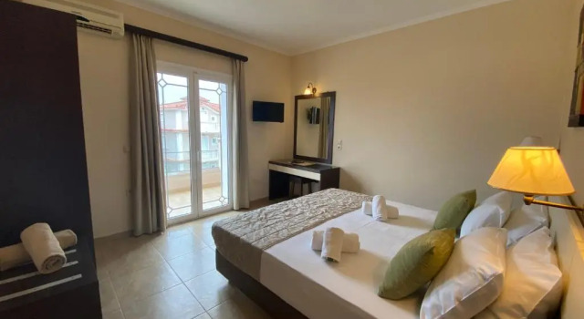 Апартаменты Porto Planos Beach Hotel