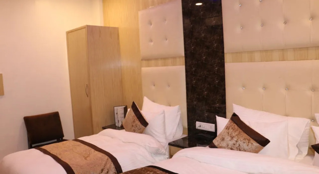 Трёхместный номер Deluxe Check In Room Chuna Mandi