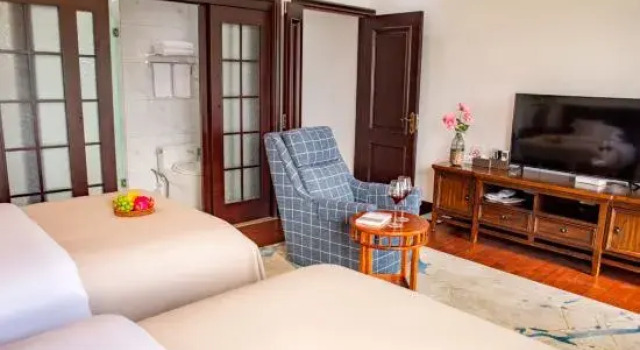 Люкс Deluxe Lijiang Boman Yuelai Homestay