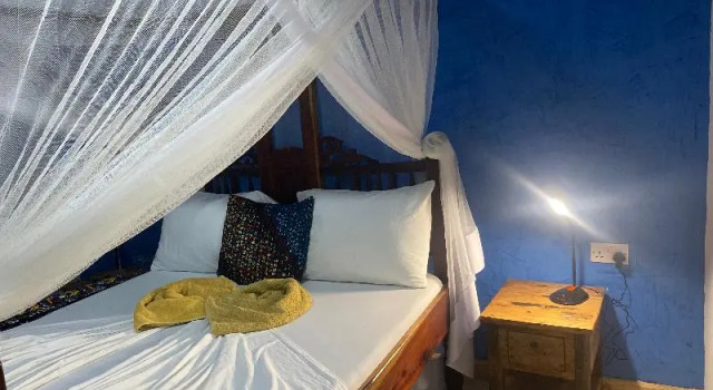Двухместный номер Standard с балконом и с видом на сад Mbuyuni Beach Village - Bungalows