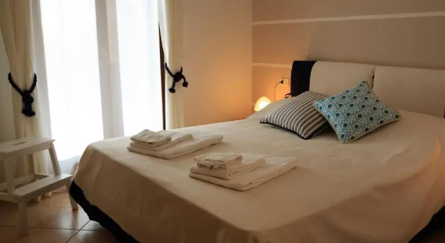 Семейные апартаменты с видом на озеро Bellasirmione - Acquachiara