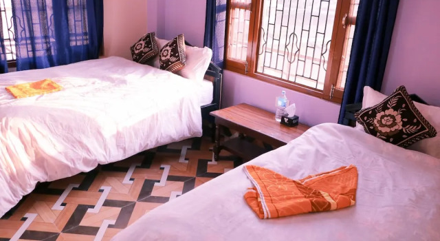 Трёхместный номер Deluxe с балконом и с видом на сад Hotel National Park Sauraha- Homely Stay and Peaceful Location with Jungle Safari arrangements