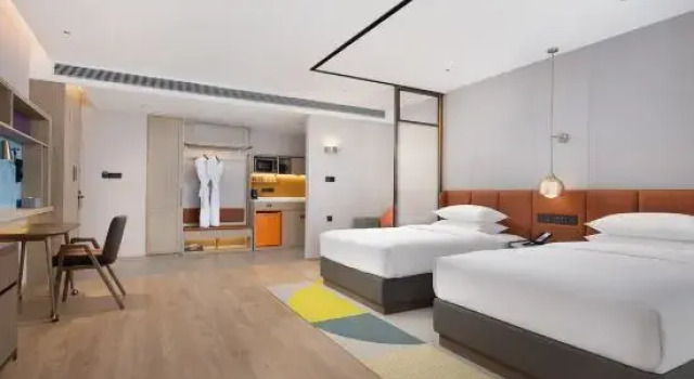 Капсула Deluxe Home2 Suites by Hilton Xingyi Jushan Plaza
