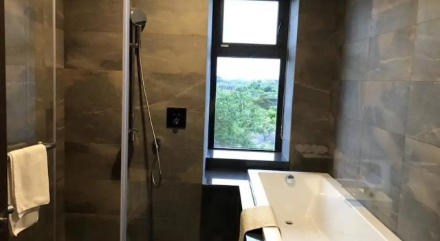 Camera quadrupla Deluxe con balcone Tan Villa