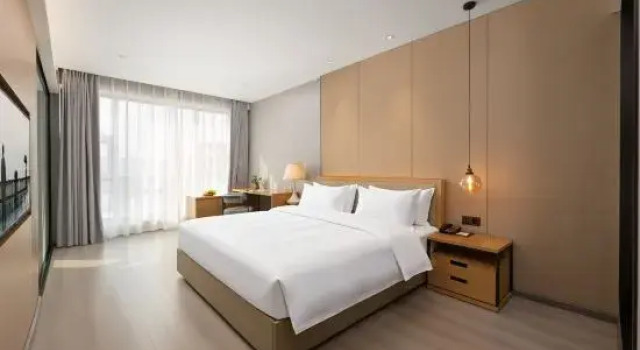Люкс Mangshi Bailongshe Hotel (Dehong Mangshi Airport Dehong Mangshi Square Branch)
