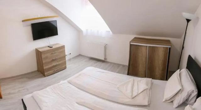 Апартаменты Deluxe Família Apartmanház