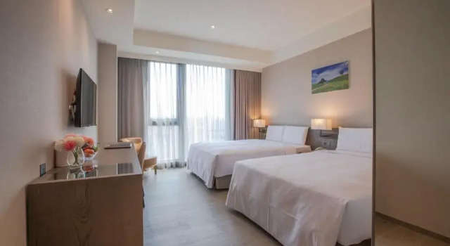 Номер Economy Jin Shi Hu Hotel