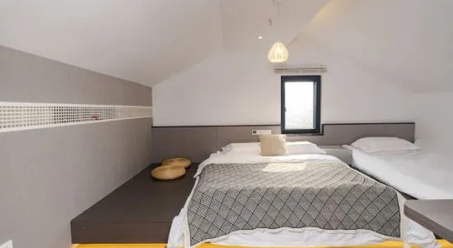 Кровать в общем номере Suzhou Yijia Homestay (Taihu Xishan Scenic Area)