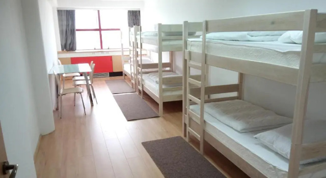 Кровать в общем номере Hostel Omnibus