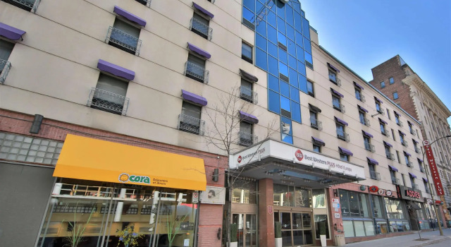 Кровать в общем номере Hotel Europa, BW Signature Collection