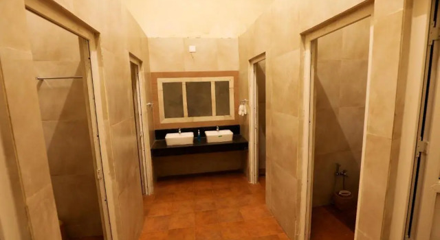 Кровать в общем номере Chow Chow Valley Resorts