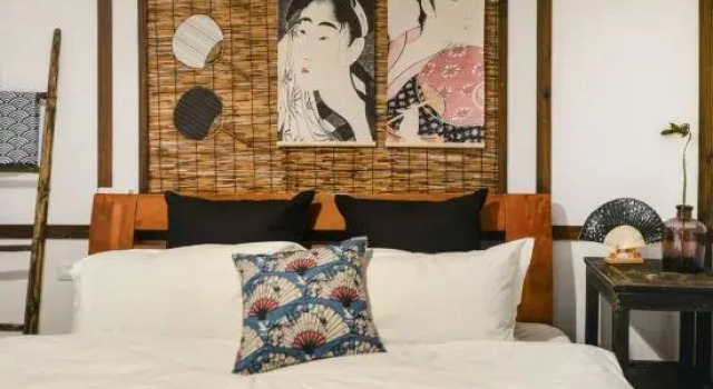 Кровать в общем номере The House B&B