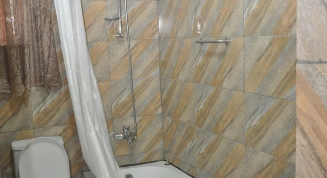 Номер Deluxe Grand Capital Hotel