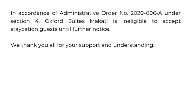 Кровать в общем номере Oxford Suites Makati