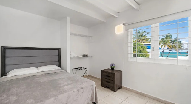 Puerto Rico Beach Rental w Pool Balcony Otium Rentals, Забронировать Апартаменты/квартира Апартаменты Сан-Хуан, рядом с Barbosa Park, Апартаменты/квартира