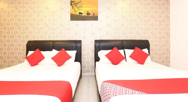 Семейный люкс OYO 718 MR J Hotel Wakaf Che Yeh 1