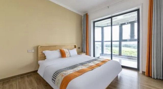 Люкс Luxury Guanjia Holiday Apartment (Haikou Mission Hills New Town Duty Free Shop)