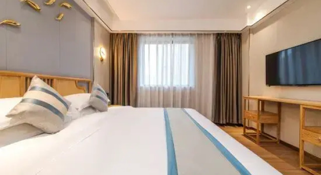 Люкс Business Shangfu Qingju Hotel (Maoming High Speed Railway Station Dongxin Times Square)