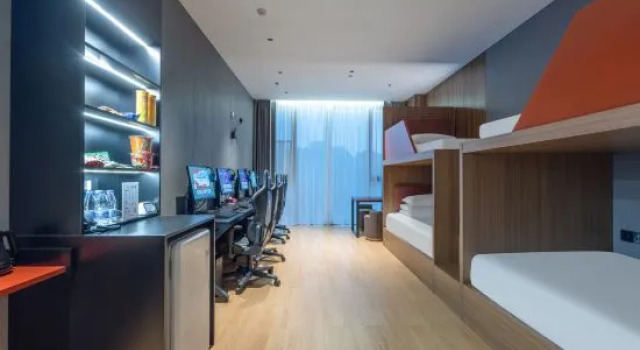 Кровать в общем номере Yunik Hotel (Ningbo 128 Plaza Jingli Fashion Centre)