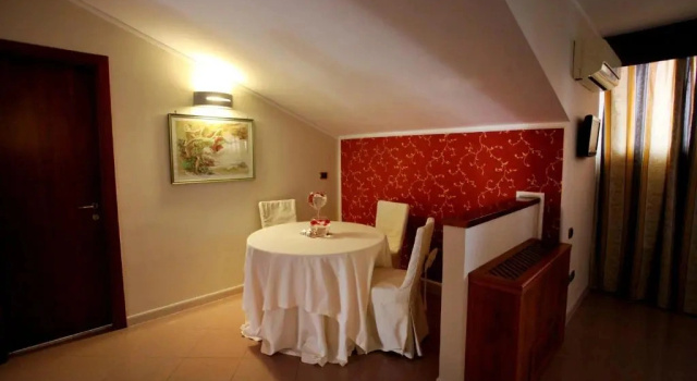 Четырёхместный люкс Belsito Hotel