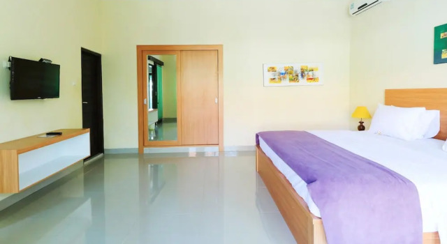 Бунгало Deluxe Taman Damai Bungalow