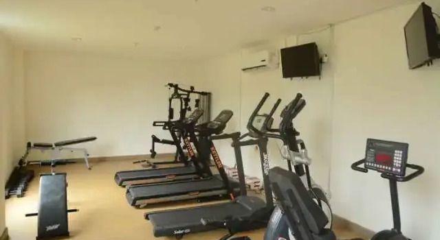 Homey and Brand New Studio Tree Park Apartment near ICE BSD By Travelio