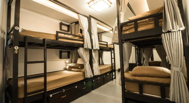 Кровать в общем номере с видом на океан Phu House