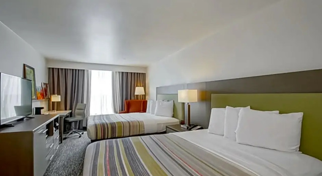 Четырёхместный люкс c 1 комнатой Country Inn & Suites by Radisson, New Orleans I-10 East, LA