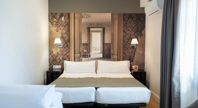 Трёхместный номер Mesón Castilla Atiram Hotels