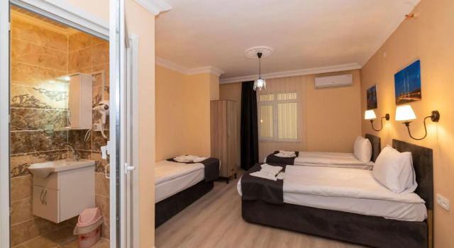 Standardowy trzyosobowy pokój Avrupa Palace Hotel