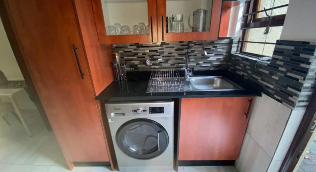 Апартаменты Phil's Condominium