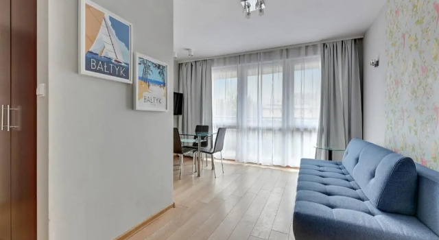 Апартаменты Sunrise apartments close to the beach & by Noclegi Renters