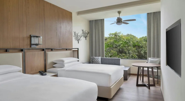 Четырёхместный номер Deluxe Jim Corbett Marriott Resort & Spa