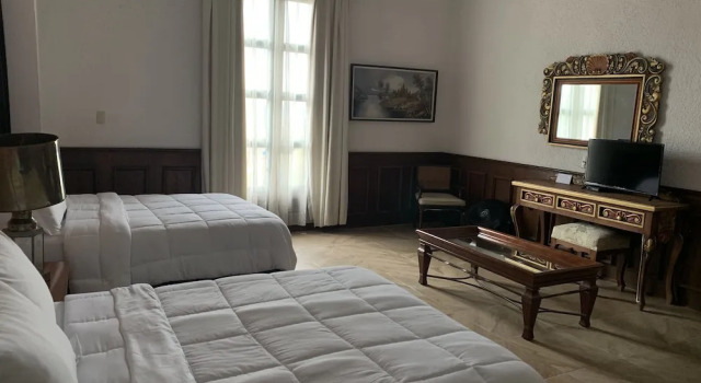 Четырёхместный номер Deluxe с балконом hotel la ermita suites