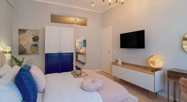Designer 2-Bedroom Flat with Balcony & Full Amenities Steps from Piata Universitatii, Забронировать Апартаменты/квартира Бухарест Muntenia, рядом с Музей коллекций произведений искусства