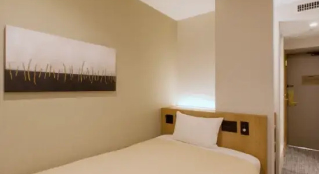 Кровать в общем номере (женский номер) Ikebukuro Royal Hotel