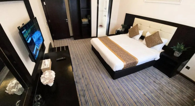 Четырёхместный люкс Deluxe Landmark Hotel - Sari