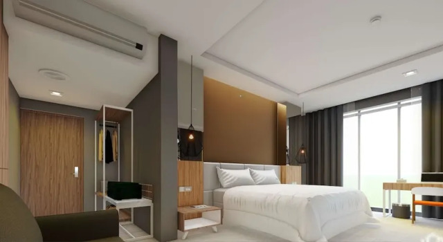 Номер Deluxe Hotel Santika Lahat