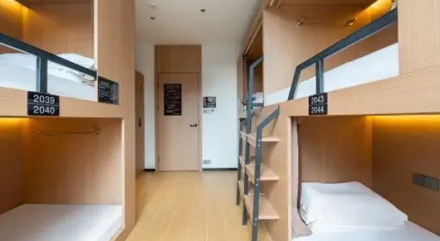 Кровать в общем номере Yizhou Tour Youth Travel Hotel,Xi'an Datang Night City Branch.