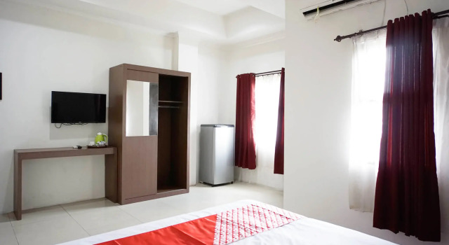 Her Mandiri Guest House, Rezervovat Penzión Hotely v Kalimantan s parkováním, Parkování