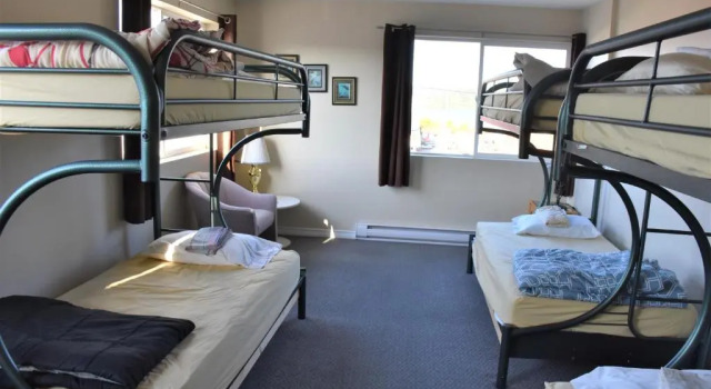 Кровать в общем номере North Coast Trail Backpackers Ltd