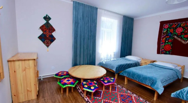 Кровать в общем номере Muras Hotel Karakol (Мурас Каракол)